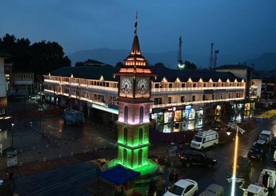 SRINAGAR, INDIA - AUGUST 14:  A view of the newly renovated Clock Tower (Ghanta Ghar) illuminated with tricolours on the eve of Independence Day, at Lal Chowk on August 14, 2023 in Srinagar, India. (Photo by Waseem Andrabi/Hindustan Times via Getty Images)